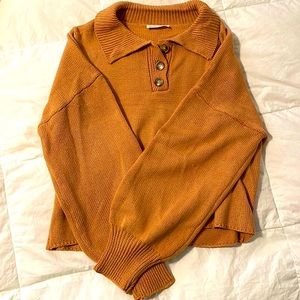 Pullover with buttons in pinkish beige